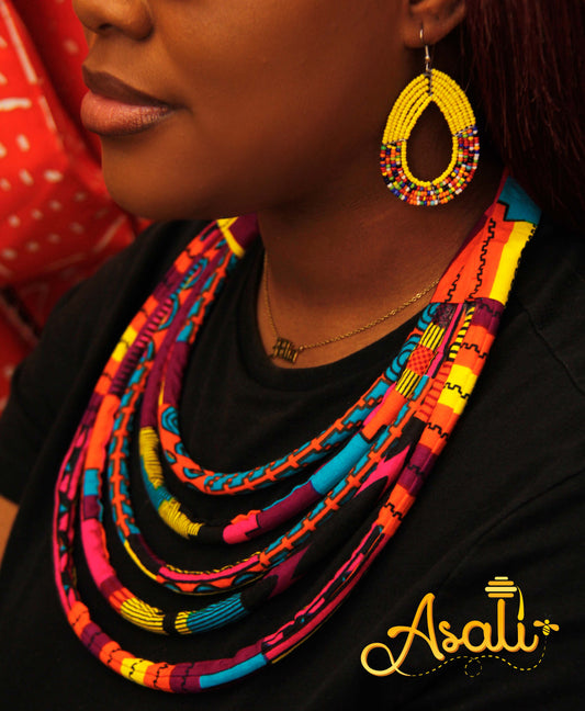 Shop Asali's African Wrapped Kente and Ankara Fabric Necklaces - Pink, Red, Orange, White, Black, Yellow